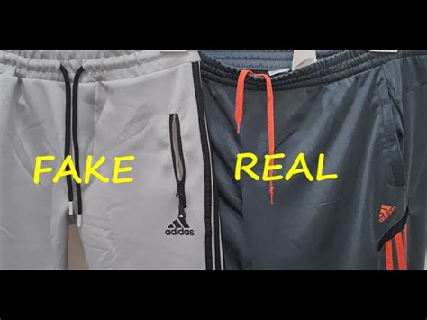 how to tell fake adidas tracksuit|genuine adidas check.